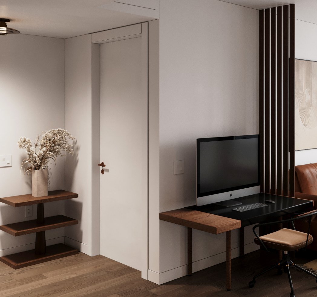 A slim walnut desk and floating shelves beside a slatted timber screen in a Brooklyn apartment